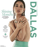 The image shows a young woman model wearing gold jewelry with emerald color jewels on fingers, wrists, ears and neck. She is not wearing a shirt, but her arms are crossed and covering her chest. She is wearing what appears to be a mint green skirt. Text overlayed on the image reads:
Modern Luxury Dallas
SHINING MOMENT, Supermodel Lily Aldridge Sparkles.
THE SMART SET: Dallas' Fashipn Flock Proves Styles is a State of Mind.
+
Store Openings, Design Finds, & More.