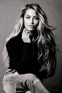 A black and white portrait of Justine Nichole, founder of Audrose a skincare collection for sensitive skin.